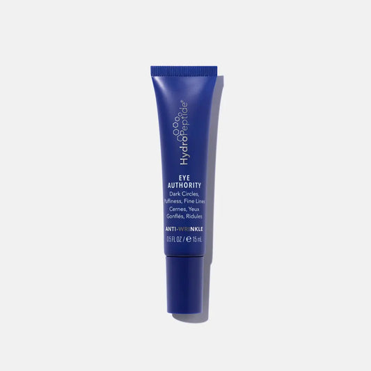 A blue tube of HydroPeptide Eye Authority eye cream , designed for brightening and reducing expression lines around the eye area.